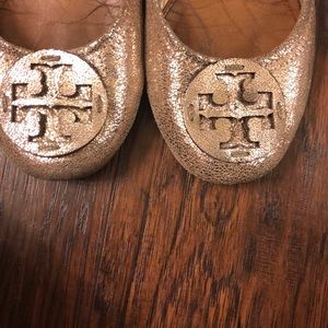 Tory Burch flats good condition cracked gold